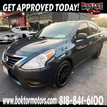 2015 Nissan Versa S Plus FWD photo